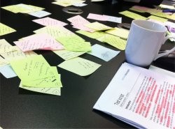 Image of post its and coffee cup