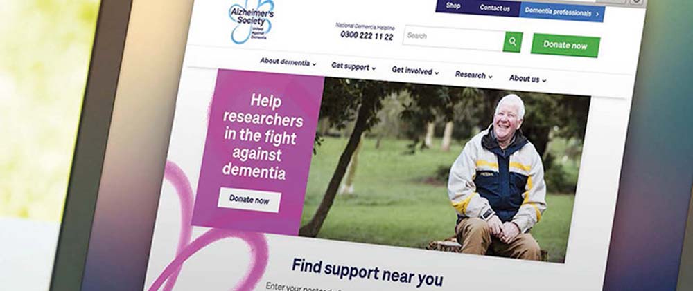 alzheimers society website displayed on laptop screen