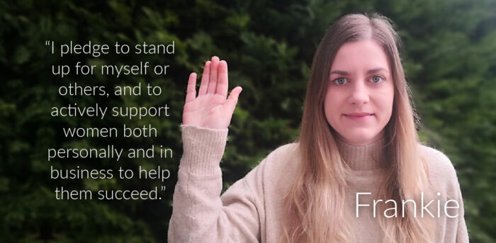 Frankie striking the #ChooseToChallenge hand up pose - "I pledge to stand up for myself or others, and to actively support women both personally and in business to help them succeed."