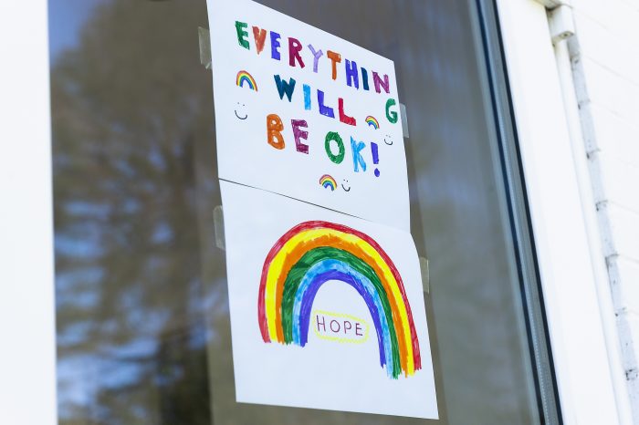 (alt=”Drawing in a window of a pandemic rainbow of Hope, with the words - Everything will be ok!”)