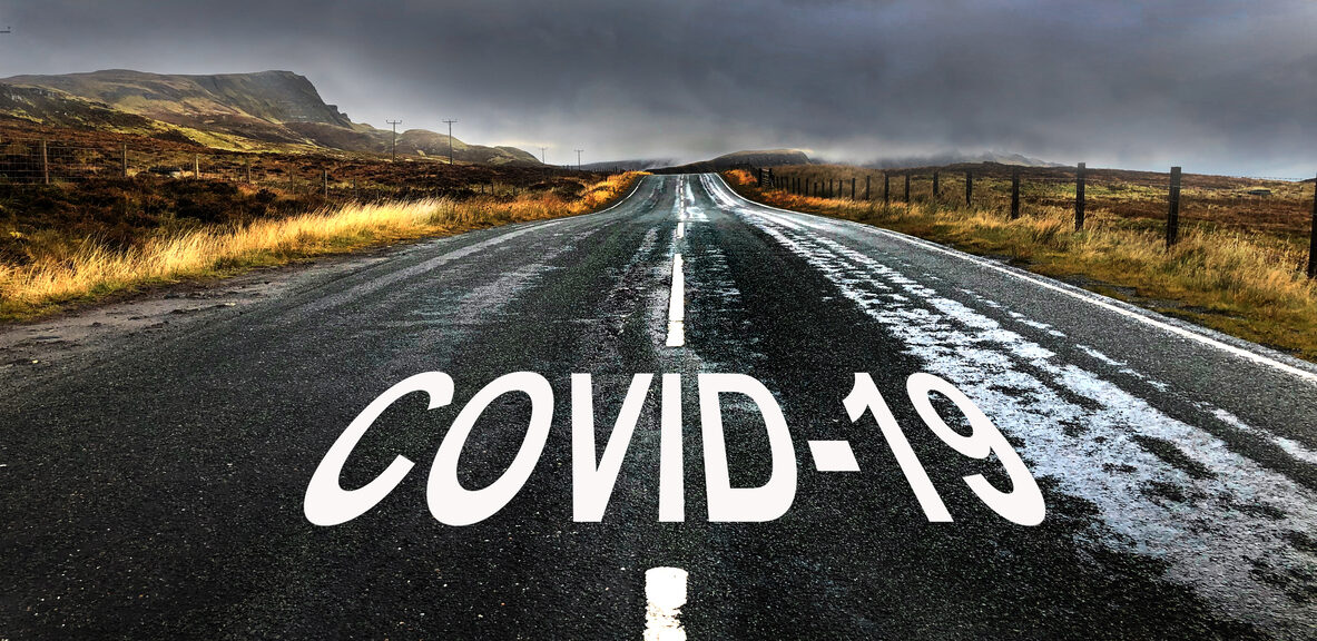 (alt="long road with the words COVID-19")
